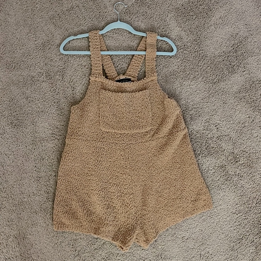 Fuzzy teddy bear overall shorts.